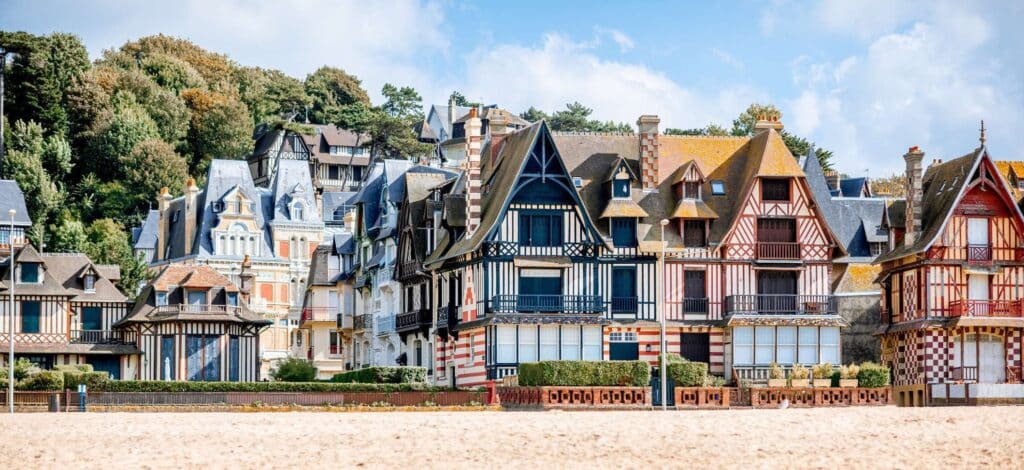 Traditional half-timbered houses and beach in Trouville, Normandy